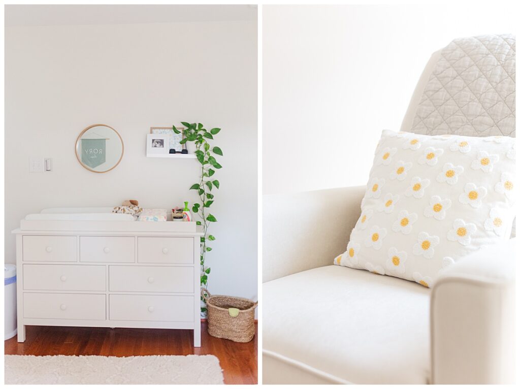 A baby's nursery featuring the cozy chair and a pillow embroidered with while daisies.